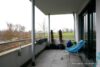 # Schicke Neubauwohnung mit hochwertiger Einbauküche, Balkon, TG-Stpl.. Bezugsfrei April! - großer, geschützter Balkon